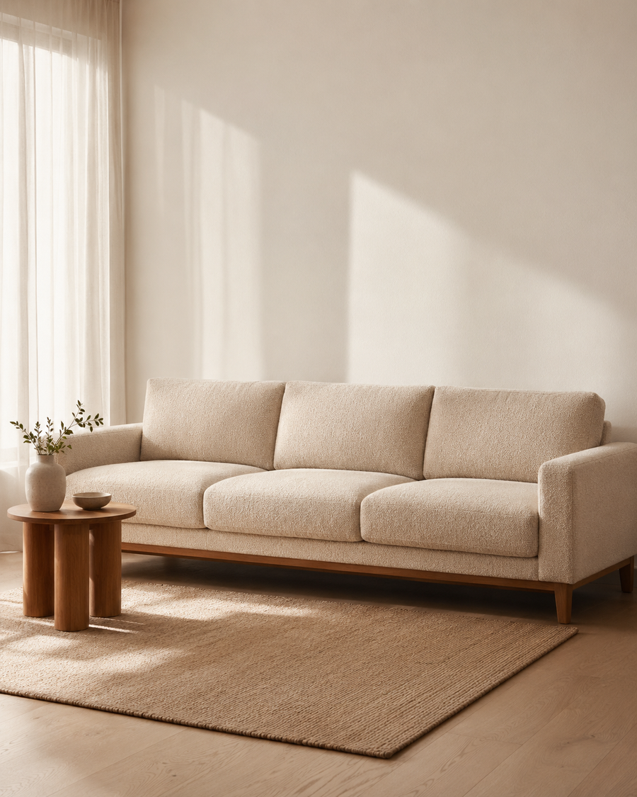 Deep lounge sofa with soft cushions in an ivory living room